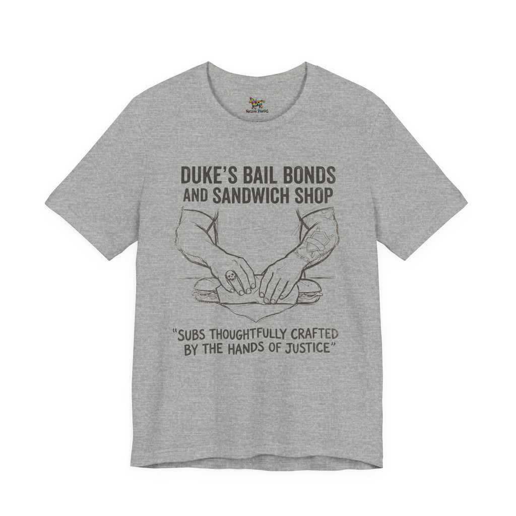 Duke's Bail Bonds & Sandwich Shop Tee — "Subs Thoughtfully Crafted by the Hands of Justice" Graphic Shirt