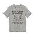Duke's Bail Bonds & Sandwich Shop Tee — "Subs Thoughtfully Crafted by the Hands of Justice" Graphic Shirt