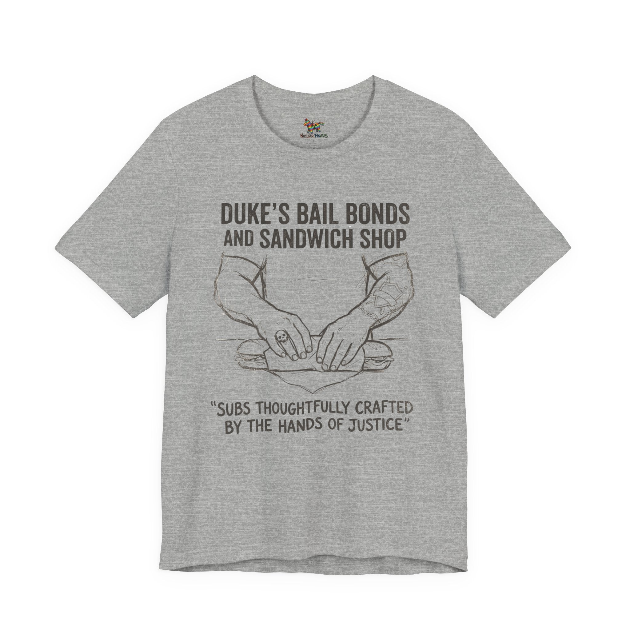 Duke's Bail Bonds & Sandwich Shop Tee — "Subs Thoughtfully Crafted by the Hands of Justice" Graphic Shirt